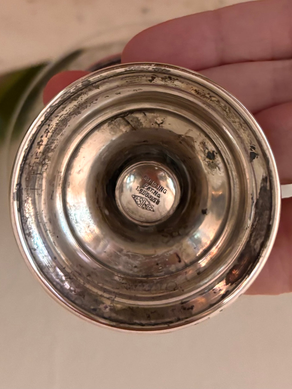 Underside of sterling silver compote base stamped STERLING PAT NO 1985956 with maker's mark.