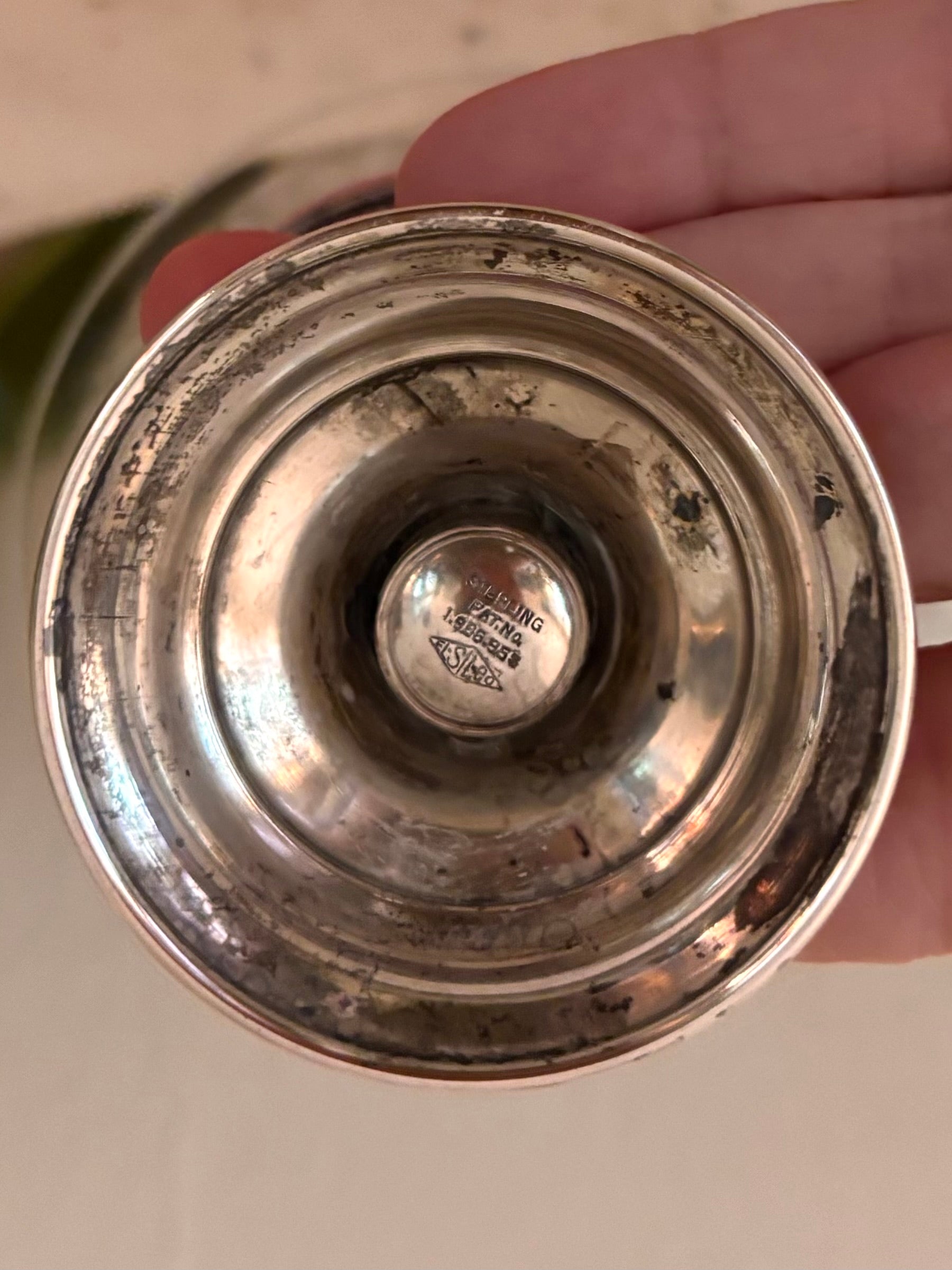 Underside of sterling silver compote base stamped STERLING PAT NO 1985956 with maker's mark.