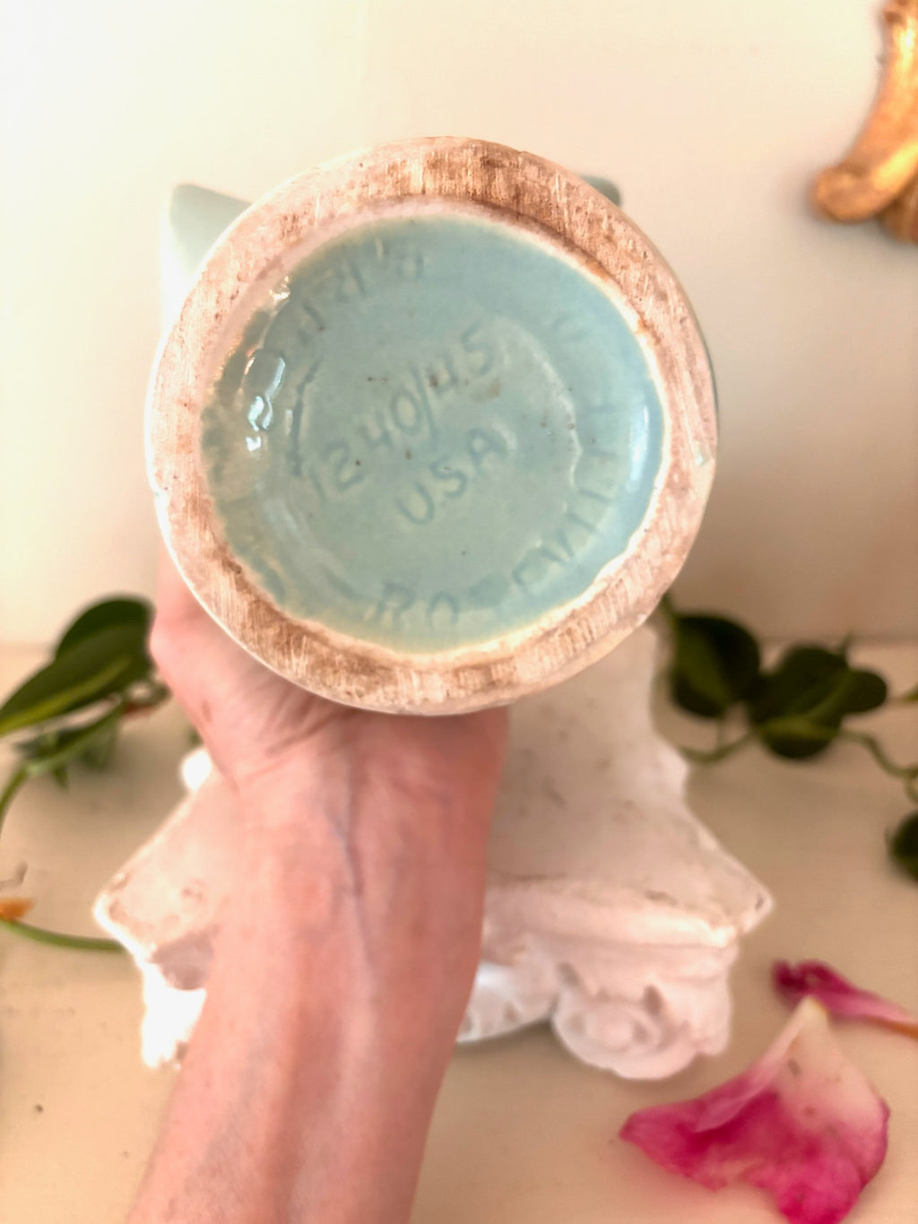 Underside of pale mint ceramic vase showing USA stamp and number 1240/45 on the base.