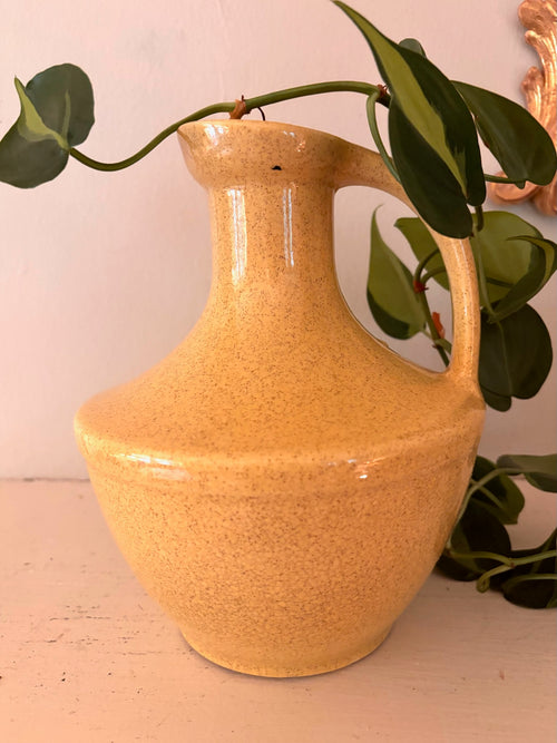 Vintage speckled yellow ceramic jug vase with handle, wide neck and flat rim, no orb.