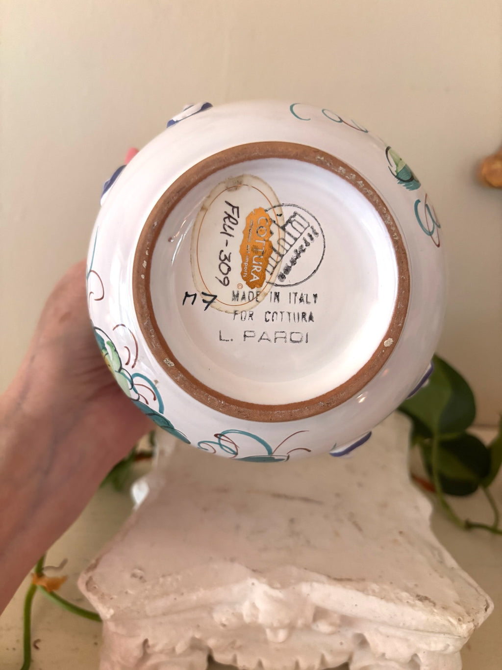 Base of Italian ceramic cachepot showing Cottura import sticker and L. Pardi maker's mark.
