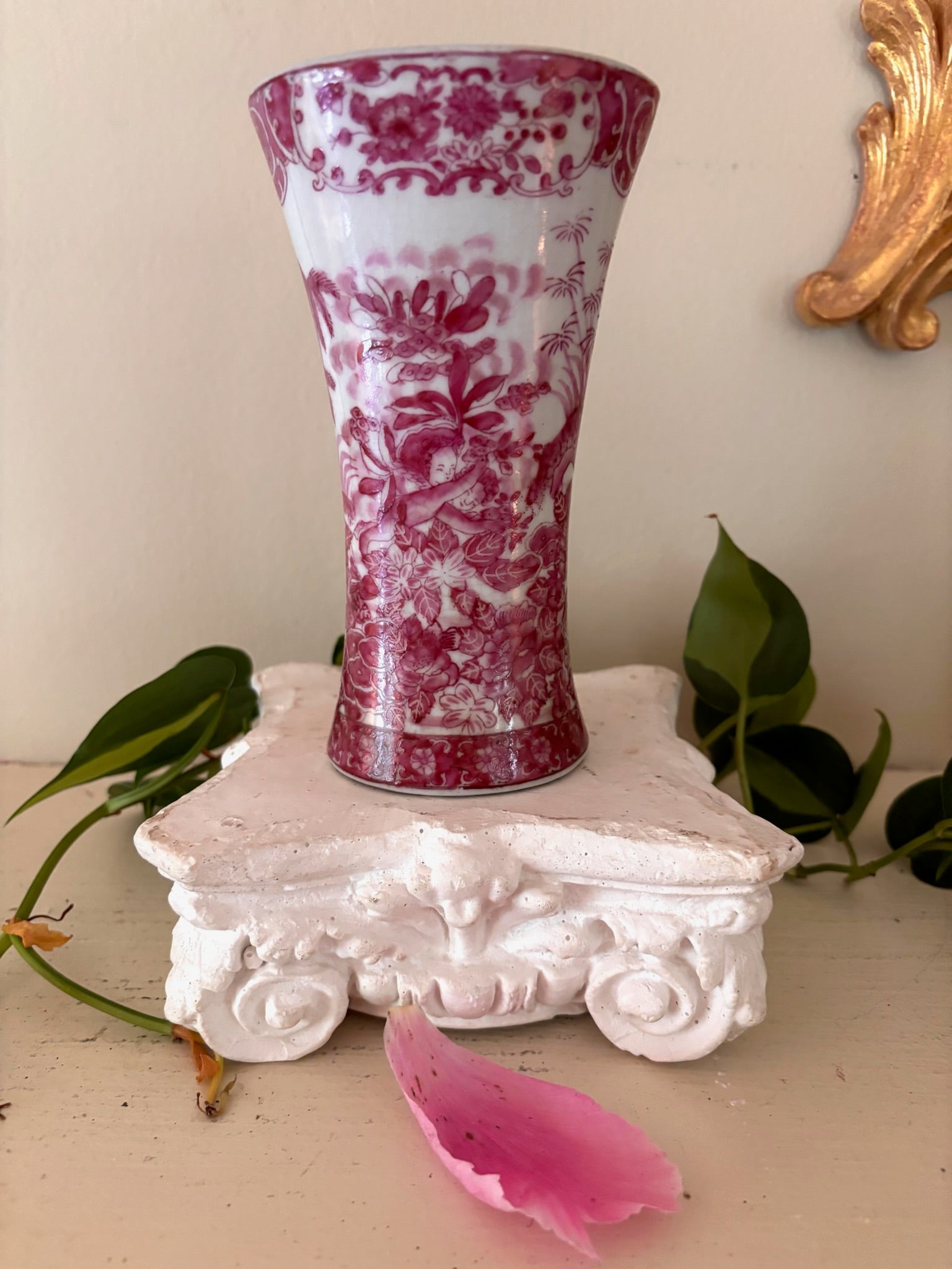 Alternate angle of antique pink chinoiserie porcelain vase showing floral and figure decoration.