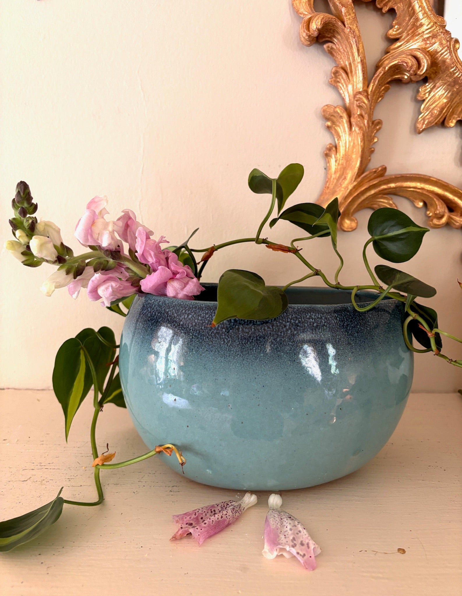 Wide oval Glidden Pottery bowl with aqua to indigo two-tone reactive glaze, view from above.