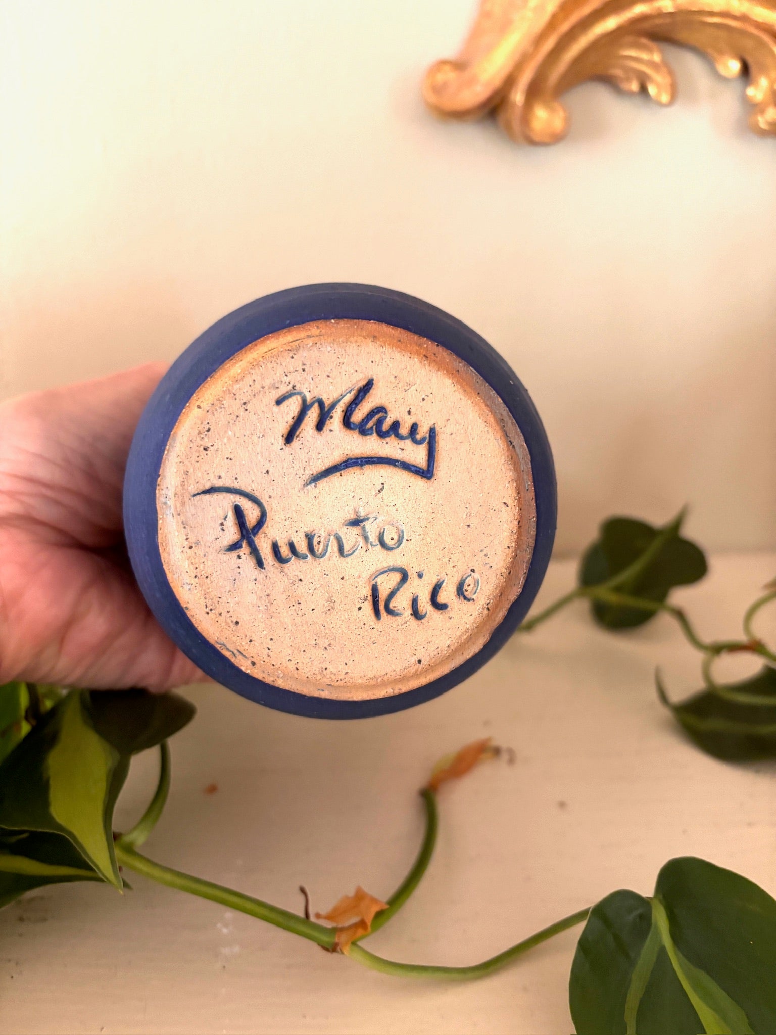 Base of small Puerto Rican ceramic vase showing handwritten "Mary / Puerto Rico" signature.