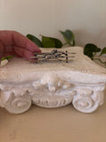 Antique silver bar brooch depicting a jockey on a galloping racehorse between two racing fence rails