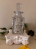 Square cut crystal spirit decanter with all-over diamond cut pattern and original faceted square stopper