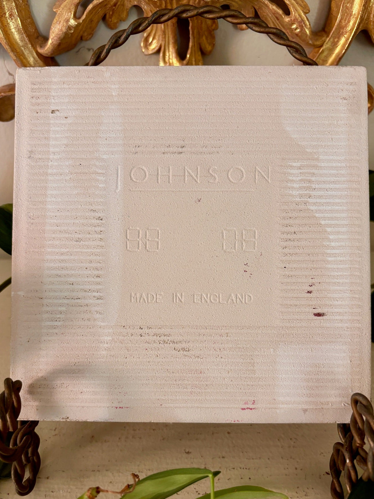 Back of the tile embossed Johnson, Made in England.